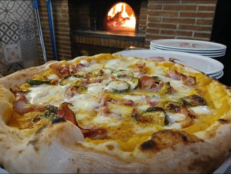 Raggio di sole (Crema di zucca, speck, zucchine, parmigiano, fior di latte)